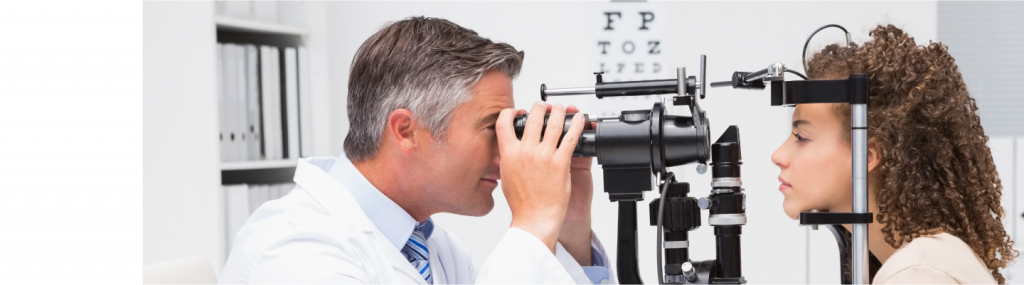 Eye Doctor Examining Patient